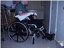 Fred in his new wheelchair, side view