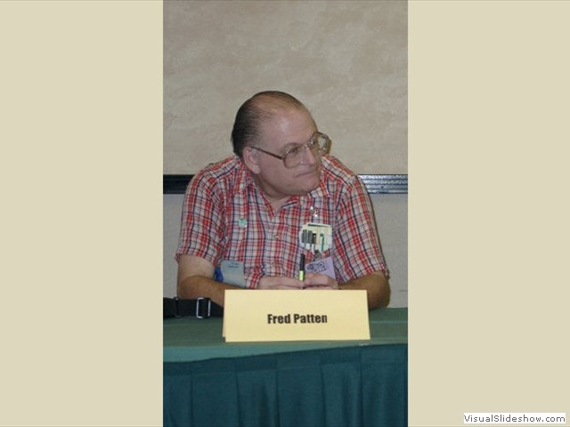 Fred on a panel at Loscon 27, November 2000. Photo by Jerry Shaw jerrysphotos.net.
