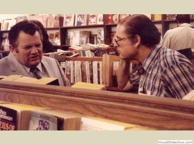 Gene Henderson and Fred at Graphic Story Bookshop, around 1974.