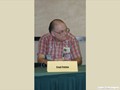 Fred on a panel at Loscon 27, November 2000. Photo by Jerry Shaw jerrysphotos.net.